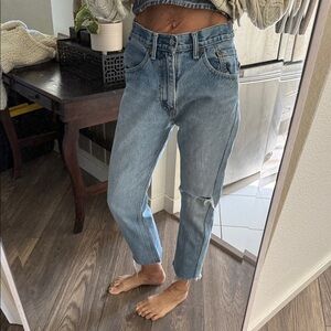 Customized pair of Levi’s 505 jeans into
About a size 26 vintage denim